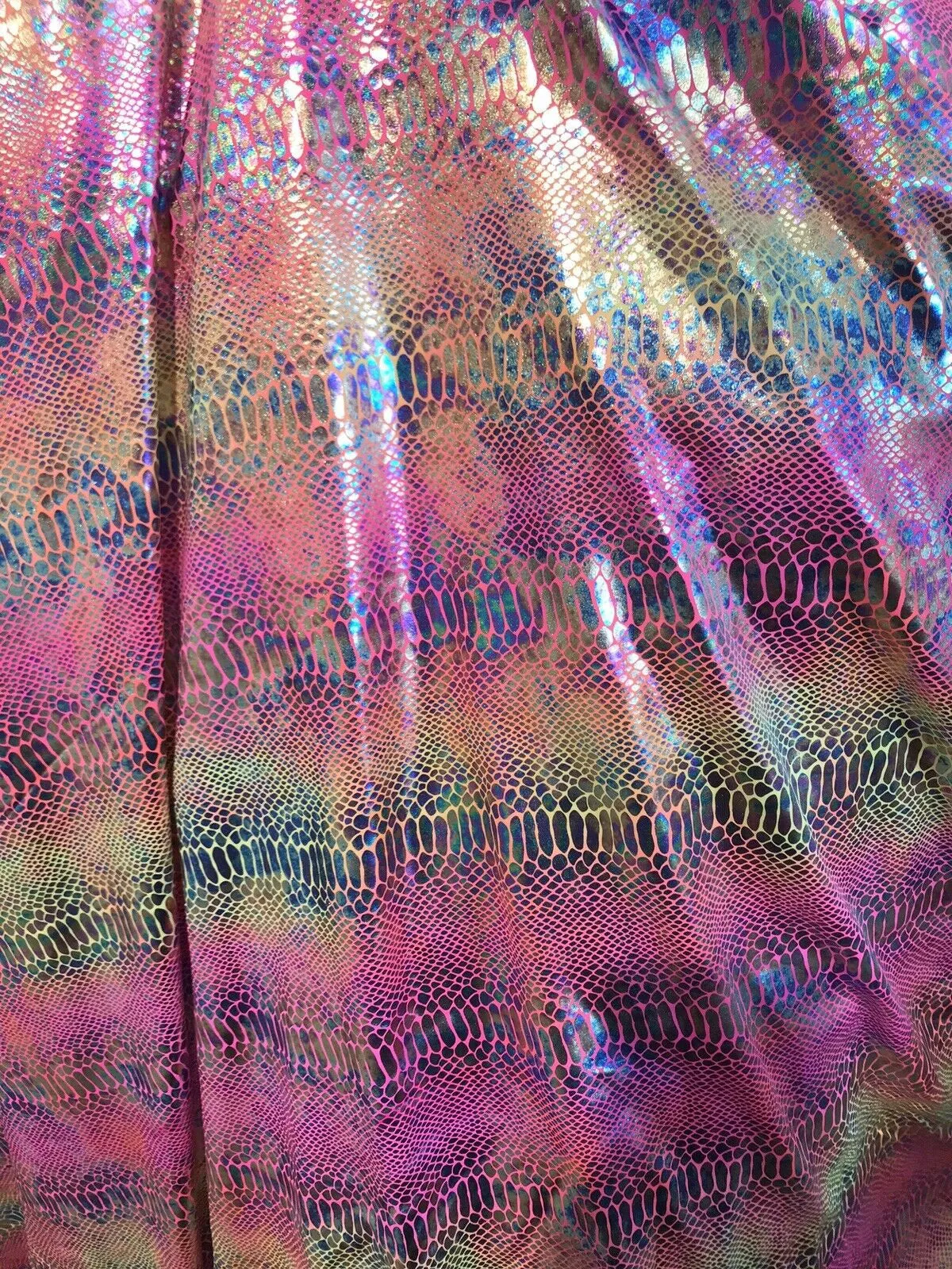 Iridescent tie dyed  snake print on a nylon 2 way stretch lycra-prom-nightgown-sold by the yard-free shipping in the usa.