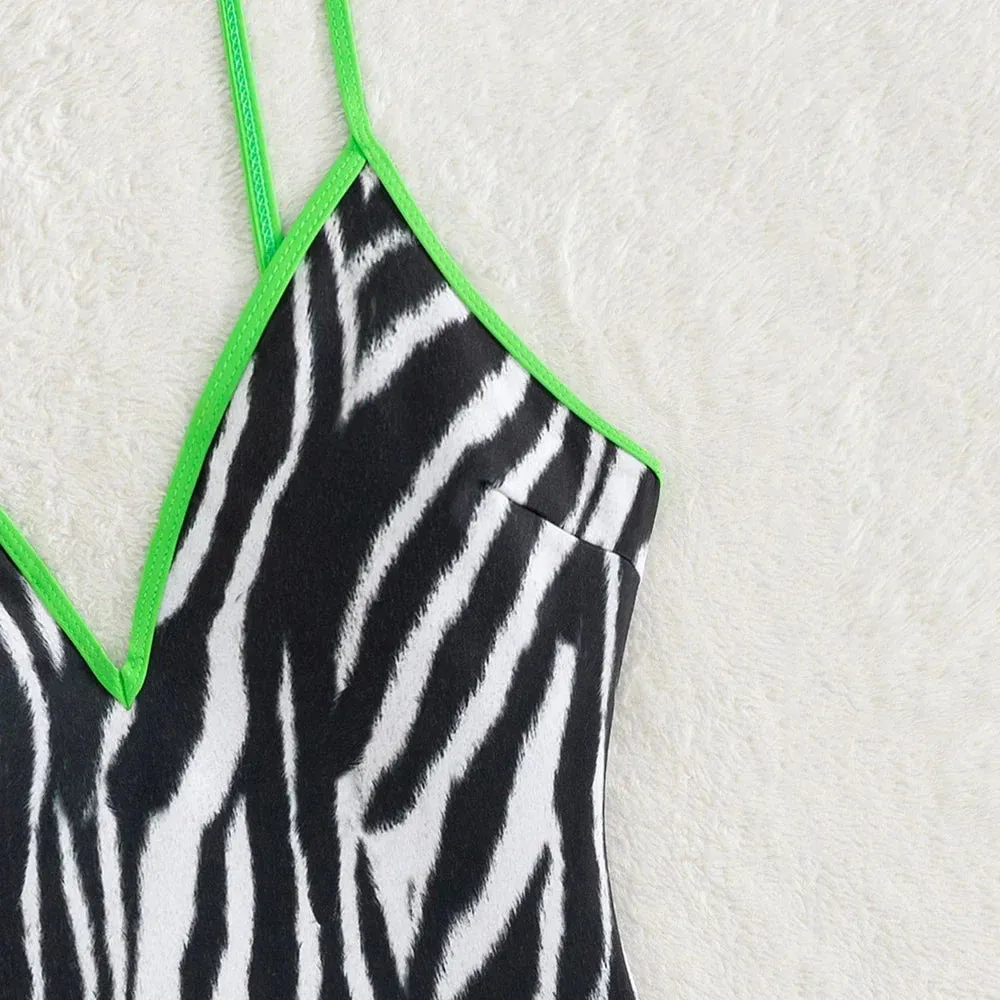 Zebra Print Plunging One-Piece Swimwear for Women with Vibrant Green Binding